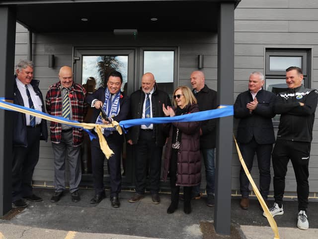 Alan Mak officially opens the new building at Westleigh Park watched by Hawks officials (from left) Tim Mellor (vice chairman), Trevor Brock (director/secretary, Derek Pope (chairman), Sue Pope, Mark Pope (director), Stuart Munro (chief executive) and Paul Doswell (manager.Picture by Dave Haines.