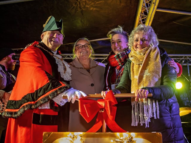 Pressing the big plunger: Mayor of Gosport Councillor Martin Pepper with Mayoress Suzanne Pepper, Lucy Ashton (Hampshire Cultural Trust) and Wendy Redman who was celebrated for her 25 years of work in the local community. Picture: Mike Cooter (251123)
