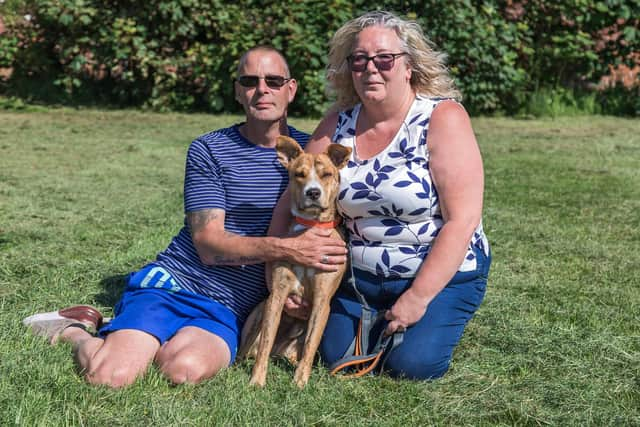 Pablo, with owners Andy Griffiths (50) and Helen Yates (50). Picture: Mike Cooter (080621)