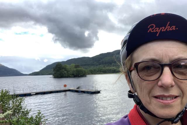 Marcia Roberts has become the first woman to complete the cycle from Land's End to John o'Groats and back again. Pictured: Marcia along her journey