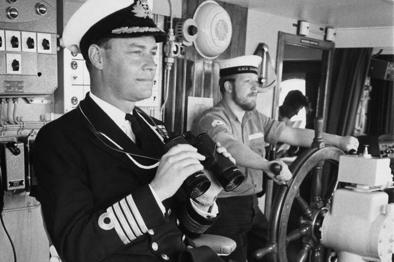 Captain Peter Buchanan (1925 - 2011) of the Royal Navy, on the bridge of the Navy's new ice patrol ship 'HMS Endurance' at Portsmouth Dockyard, UK, during a press visit, 8th June 1968. (Photo by Bob Aylott/Keystone/Hulton Archive/Getty Images)