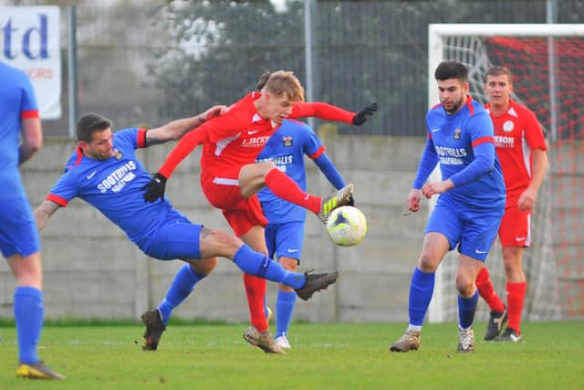 Horndean's Alfie Lis is challenged. Picture: Martyn White