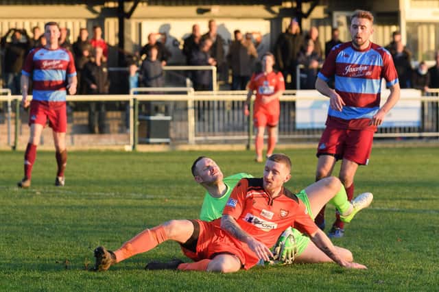 AFC Portchester striker Lee Wort in action during last December's home game with Hamworthy United that attracted a capacity 300 attendance to The Crest Finance Stadium. Picture: Keith Woodland