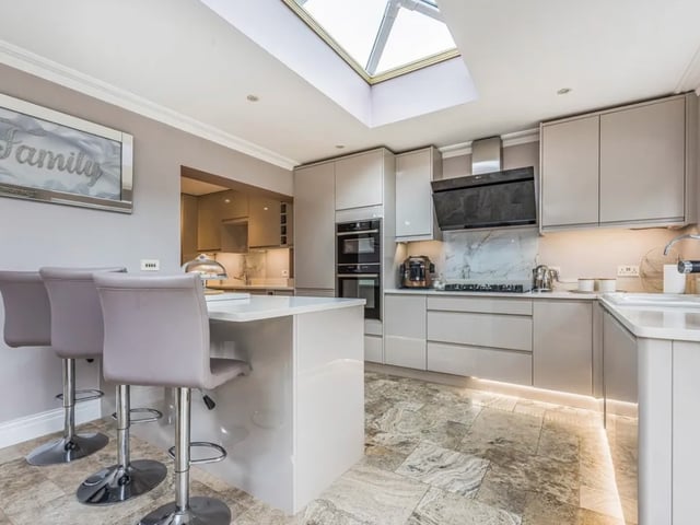This property comes with four bedrooms, two bathrooms and two reception rooms as well as a number of hidden luxuries.