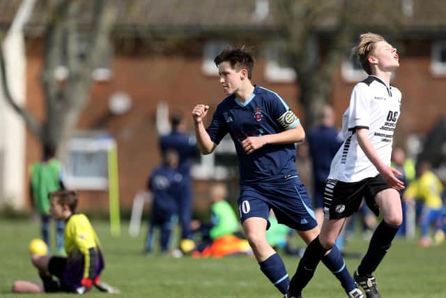 Current Horndean striker Evan Harris celebrates a goal for Pickwick Lions U15s in 2019. Picture: Chris Moorhouse