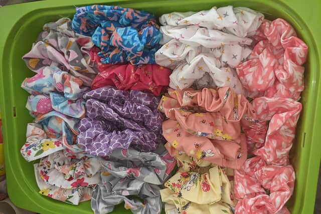 The hair scrunchies made by Grace to sell on her stall