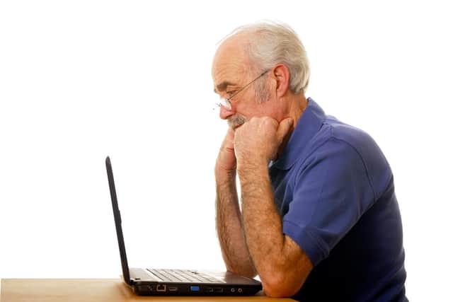 A man struggling to use a computer. Picture: Shutterstock