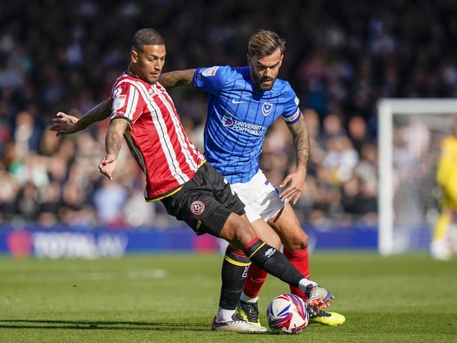 Marlon Pack tackles Sheffield United defender Alfie Gilchrist in the first half against Sheffield United. Picture: Jason Brown/ProSportsImages