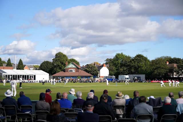 Crowds watch on as Hampshire's Joe Weaterley bats against Lancashire at Aigburth. Picture: Martin Rickett/PA Wire.
