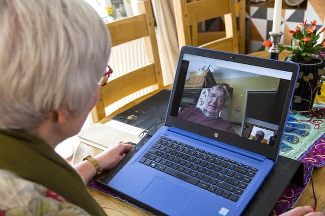 Lorna Jackson, from Fareham, talking to her father Jess Rhoades over Skype while he self-isolates. Picture: Clive Jackson