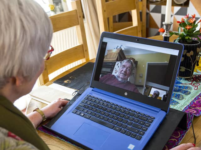 Lorna Jackson, from Fareham, talking to her father Jess Rhoades over Skype while he self-isolates. Picture: Clive Jackson