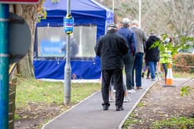 Pictured: People queuing to get their booster jab at  the Covid-19 vaccination centre at St Jame s Hospital, Portsmouth

Picture: Habibur Rahman