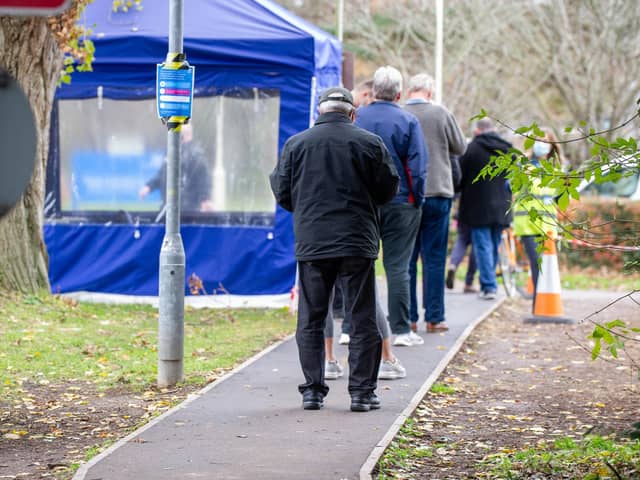 Pictured: People queuing to get their booster jab at  the Covid-19 vaccination centre at St Jame s Hospital, Portsmouth

Picture: Habibur Rahman