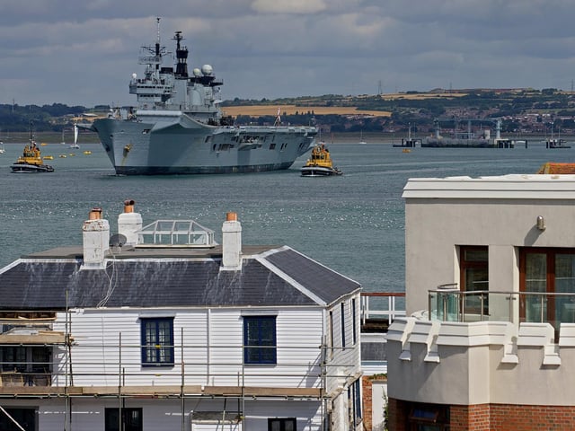HMS Illustrious leaving Portsmouth Naval Base on August 12, 2013. Picture: Andrew Cowie/AFP via Getty Images