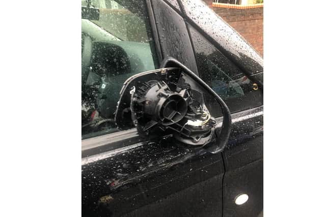 Damage caused by a delivery lorry attempting to navigate congestion on St Helens Parade. Picture: Mark Trapani