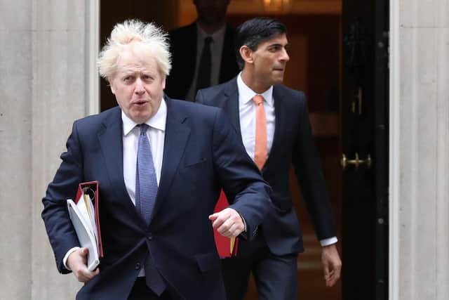 Prime Minister Boris Johnson (left) and Chancellor of the Exchequer Rishi Sunak who will both be taking part in a daily contact testing pilot which allows them to continue to work. Issue date: Sunday July 18, 2021.