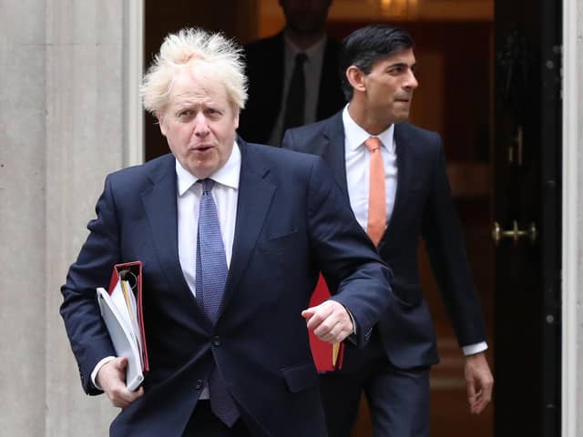 Prime Minister Boris Johnson (left) and Chancellor of the Exchequer Rishi Sunak who will both be taking part in a daily contact testing pilot which allows them to continue to work. Issue date: Sunday July 18, 2021.