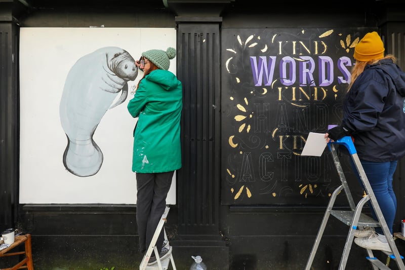 Sadie Were, left, and Frustrated Creative (aka Holly Milner) at work. Ladyjam, a female only street art event in Osborne Road, Southsea 
Picture: Chris Moorhouse (jpns 270224-12)