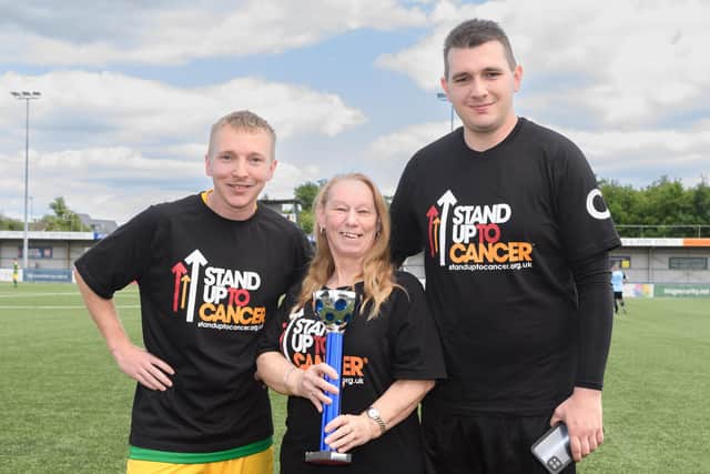 Pictured is: Gary Doran, Samantha Ross and Ryan Doran.

Picture: Keith Woodland (280521-4)