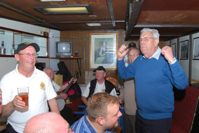 Ellis with friends enjoying a sing-a-long