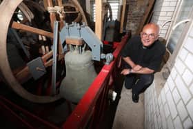A new bell ringing system has recently been installed at Southwick Church thanks to a donation from an American man who was married there in the 1970s. Rev Simon Brocklehurst with the bells. Picture: Sam Stephenson.