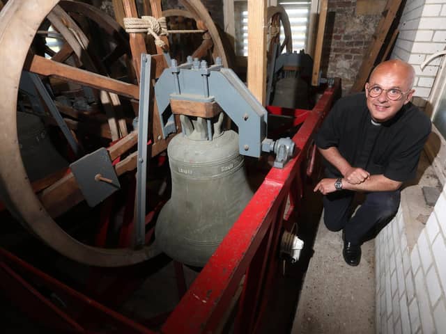 A new bell ringing system has recently been installed at Southwick Church thanks to a donation from an American man who was married there in the 1970s. Rev Simon Brocklehurst with the bells. Picture: Sam Stephenson.