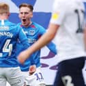 Ronan Curtis celebrates scoring against Oxford in the League One play-off semi-finals. Picture: Joe Pepler