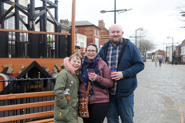 Penny and Mark Howes with their daughter Elodie, 10, from Fareham.
Picture: Sarah Standing (261220-650)