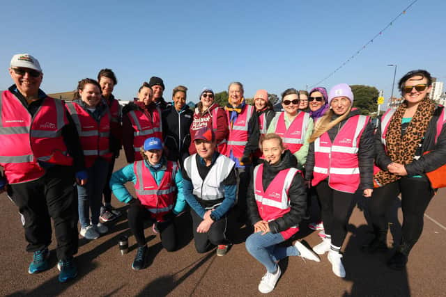 Dame Kelly, standing sixth from left, with run director Chris Kenyon, in white bib, and other volunteers. Southsea parkrun with Olympic gold medallist Dame Kelly Holmes, who was working on behalf of new parkrun sponsor De'Longhi
Picture: Chris Moorhouse (jpns 190322-13)