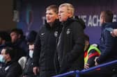 Kenny Jackett, right, temporarily joins Joe Gallen pitchside for today's 1-0 defeat at the hands of Blackpool.