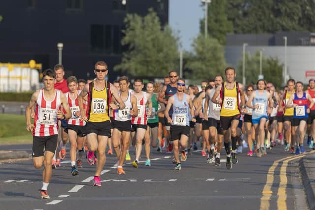 Eventual Lakeside 5k series race winner Ben Brown (51) leads the rest of the field. Picture: Paul Smith.