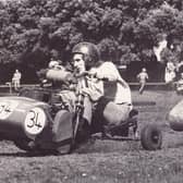 Lawnmower drivers race against each other during the Portsmouth Lawnmower Grand Prix, held at St James Hospital, Milton on July 27 1980. The News PP3706