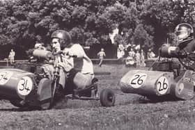 Lawnmower drivers race against each other during the Portsmouth Lawnmower Grand Prix, held at St James Hospital, Milton on July 27 1980. The News PP3706