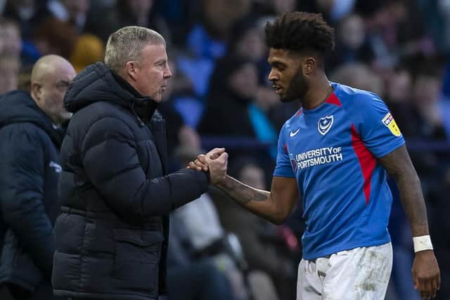 Pompey boss Kenny Jackett and Ellis Harriosn. Picture: Daniel Chesterton