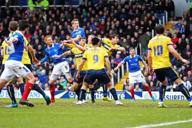 Paul Robinson in the thick of the action against Oxford United in February 2015. Picture: Joe Pepler