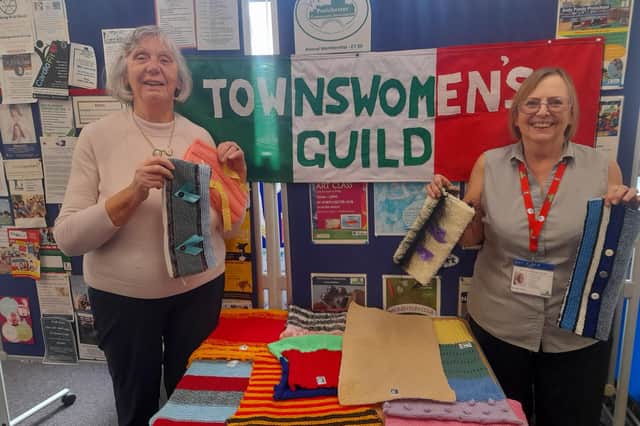 Marjorie Brand, secretary of Portchester Townswomen's Guild, donated some twiddle muffs to Jean Kelly at the Hub in Portchester
