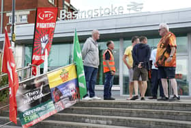 Members of the Rail, Maritime and Transport union (RMT) on the picket line outside Basingstoke train station today Picture: Andrew Matthews/PA Wire