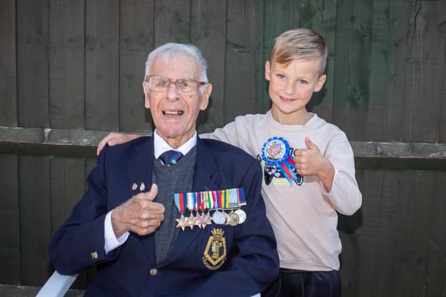 Pictured:  Reginald Plowmanwith grandson, James.
Picture: Habibur Rahman