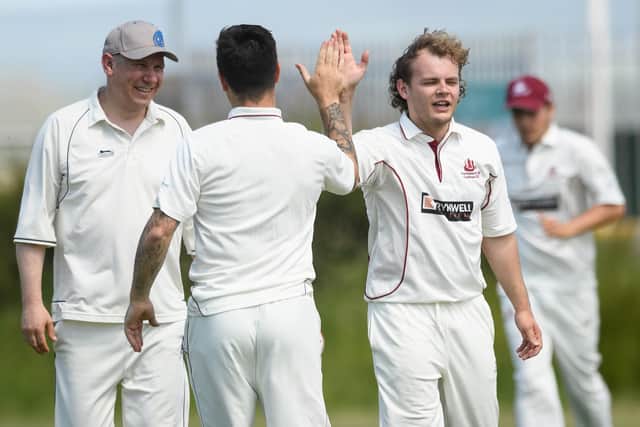 Portsmouth & Southsea 4ths bowler Steve Pinhorne celebrates a wicket. Picture: Keith Woodland