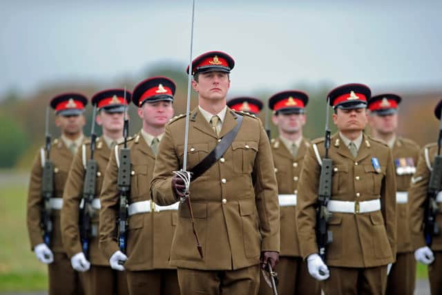 Soldiers of the 16th Regiment Royal Artillery take part in a re-unification parade of their regiment and associated batteries at Thorney Island.Picture Ian Hargreaves (161299-3)