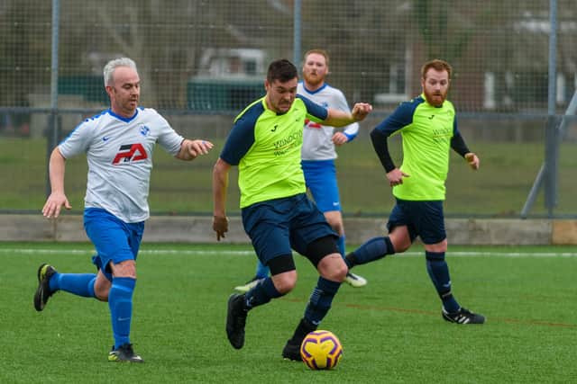 Remi Cake on the ball for Harvest Home against West Wight Reserves at Cowplain Schoo. Picture: Vernon Nash