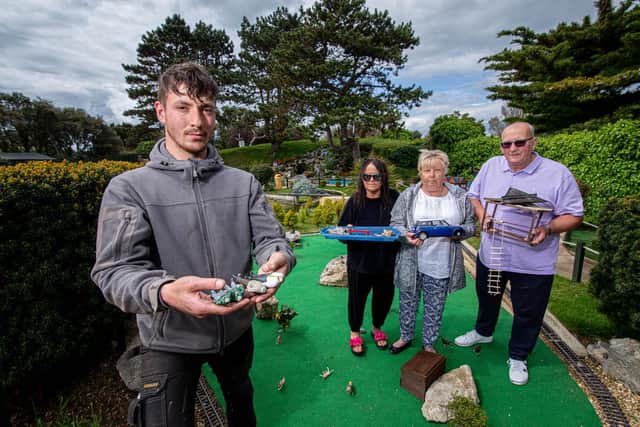 Assistant manager, Harry Wilson, Janet Neil, Phyllis and Ian Wilson with some of the damaged miniature figures at Southsea Model Village. Picture: Habibur Rahman