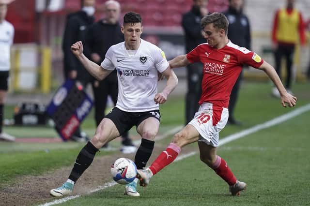 Pompey target Scott Twine tackles James Bolton during last month's County Ground encounter. Picture: Jason Brown/ProSportsImages