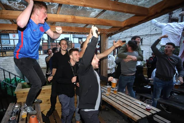 England fans pictured at the Milton Arms in Portsmouth, UK, about to watch England play on TV in the Semi-finals at Wembley.

Pictured are fans enjoying the night.

Picture: Sam Stephenson