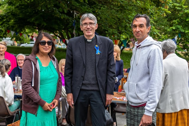 Anthony Cane (Dean of Portsmouth, centre) with Susan Hill and Gurbinder Kalirai at the Portsmouth Cathedral street party. Picture: Mike Cooter (050622)