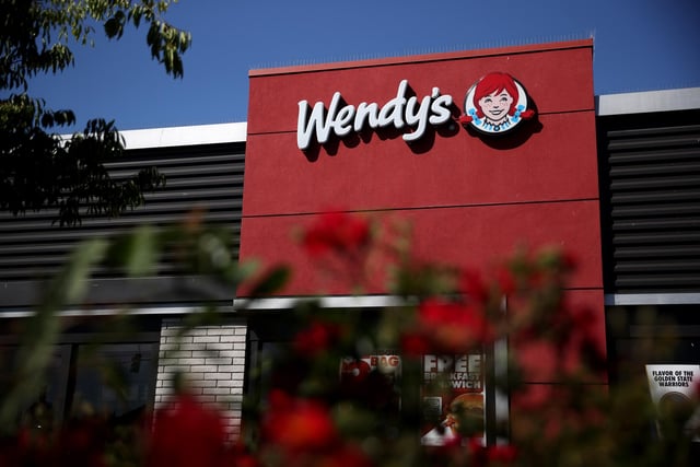 Wendy's, and its famous red haired mascot, has returned to the UK in recent years. It originally had 20 branches but the last one closed in 1999, but returned in the 2020s. It has yet to open a restaurant in Portsmouth. (Photo by Justin Sullivan/Getty Images)