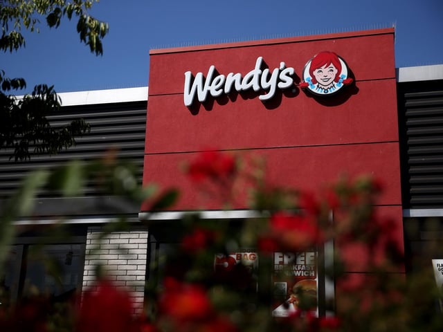 Wendy's, and its famous red haired mascot, has returned to the UK in recent years. It originally had 20 branches but the last one closed in 1999, but returned in the 2020s. It has yet to open a restaurant in Portsmouth. (Photo by Justin Sullivan/Getty Images)