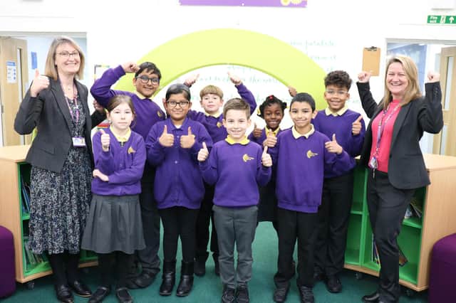 Penbridge Junior School pupils and staff celebrate their Advanced Thinking School accreditation award