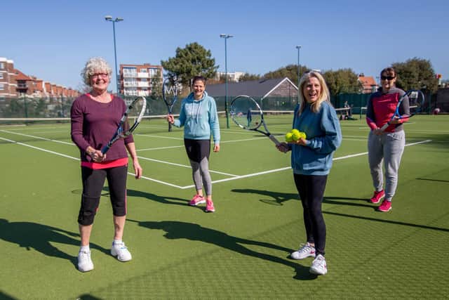 Ease of lockdown restrictions are lifted as people up to a group of six can meet outdoors on 29 March 2021.

Pictured:  Deb Prytherch, Kate Wharton,  Heidi Leaver and Justine Sayer ready to play tennis at the tennis courts in Canoe Lake, Southsea

Picture: Habibur Rahman