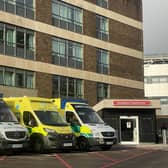 Ambulances are seen outside A&E at Queen Alexandra Hospital on December 31. Picture: Finnbarr Webster/Getty Images)
